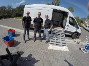 The Speedy Floor Removal team outside their truck ready to get to work.